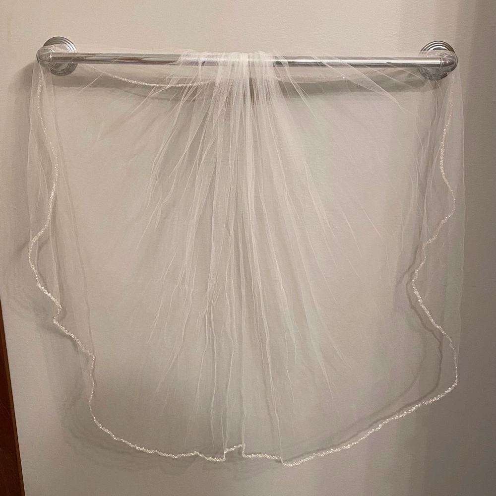 David’s Bridal veil, 30” long.